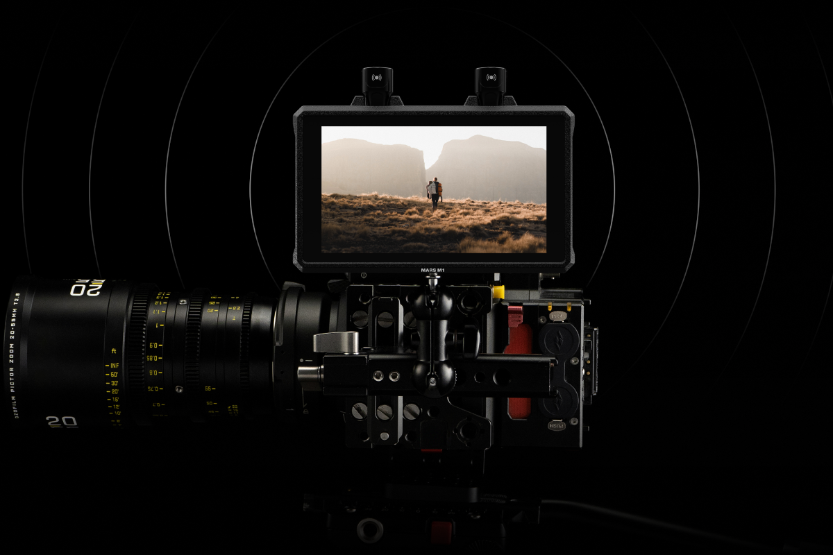 Two Hollyland Mars M1 Enhanced video monitors with antennas, displayed on a white background, showcasing their compact design.
