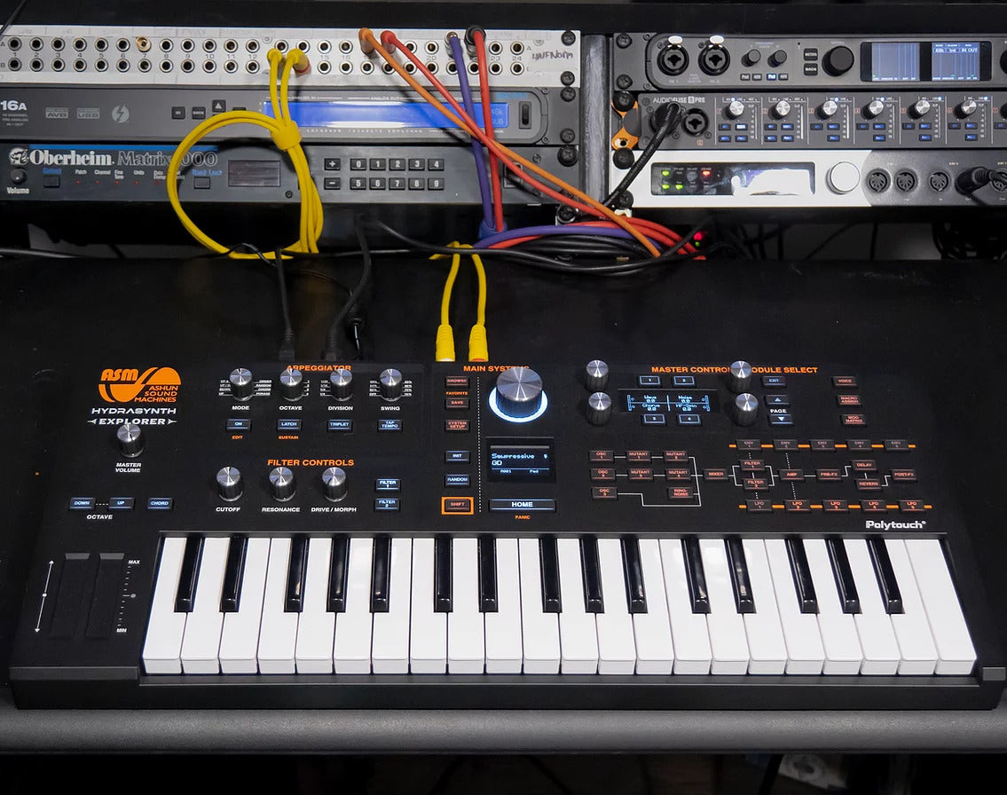 ASM Hydrasynth Explorer synthesizer with keyboard and control knobs, compact design ideal for versatile sound creation.