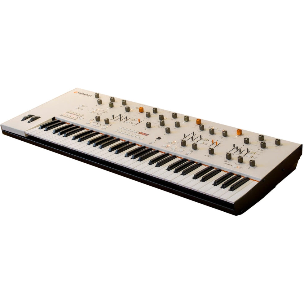 Frap Tools Magnolia keyboard synthesizer with multiple control knobs and patch points, showcasing its compact, professional design.