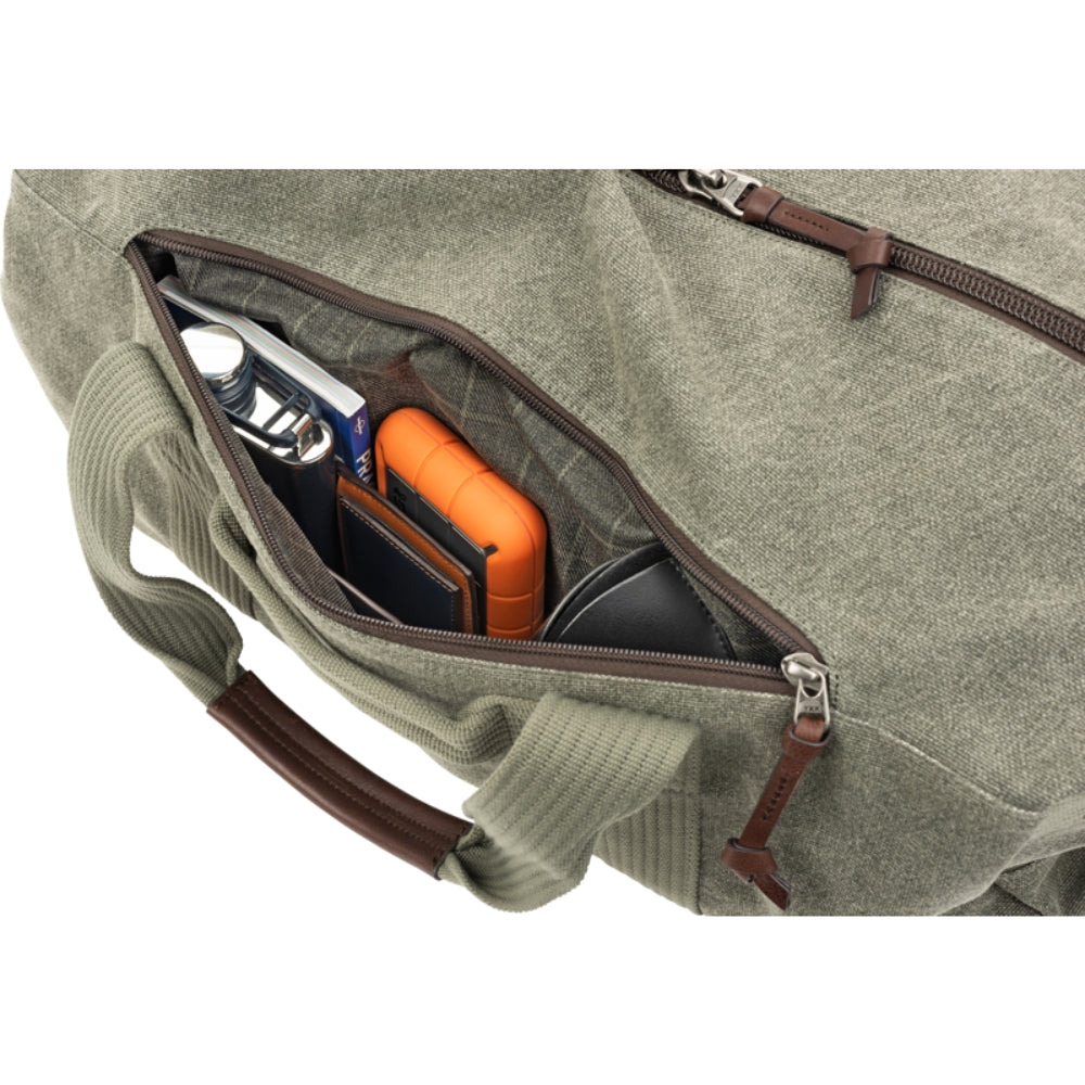 Think Tank Retrospective Duffel, video equipment bag with padded compartments and durable design for camera gear storage.