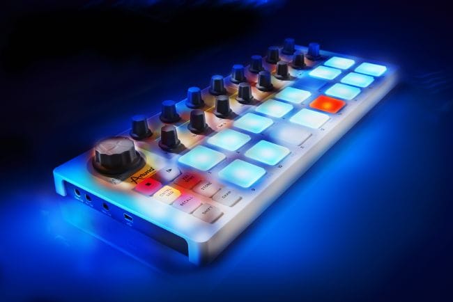 Arturia BeatStep sequencer with pads, knobs, and buttons for music production and electronic sequencing.