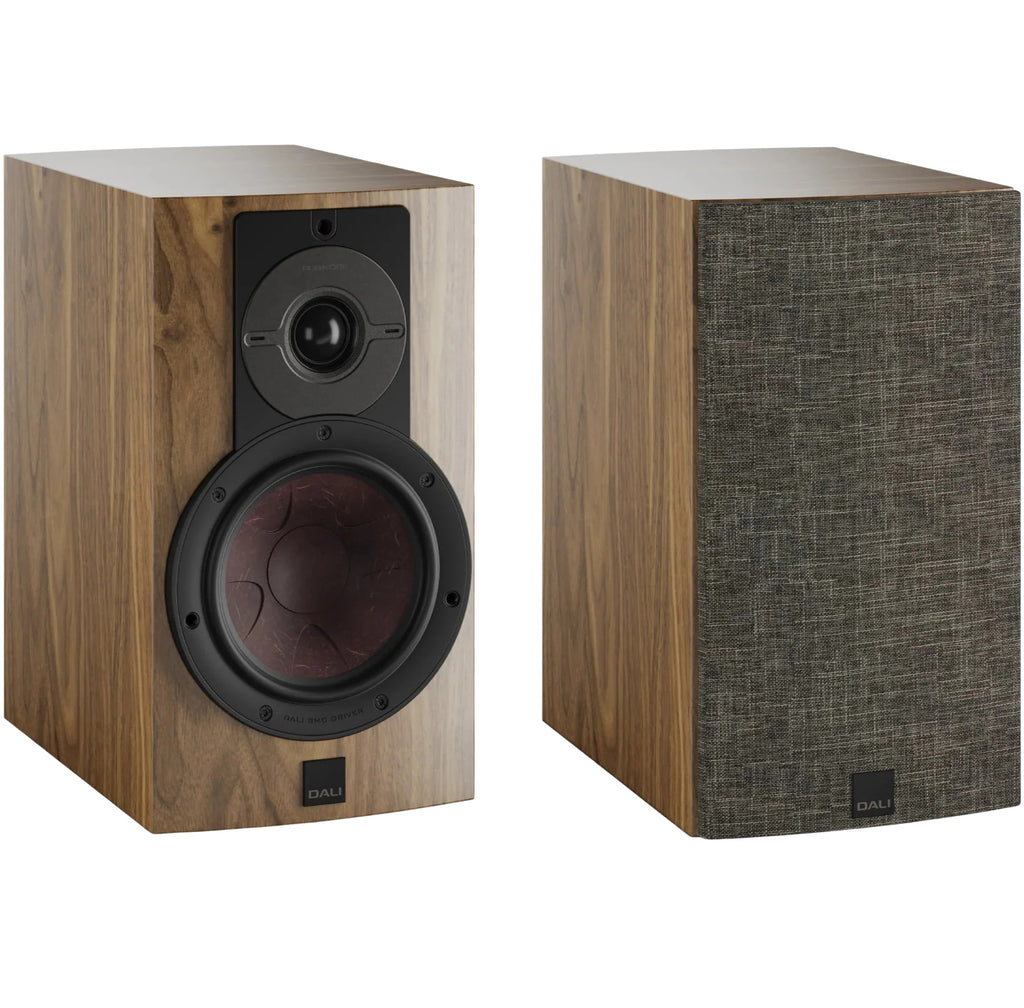 DALI Rubikore 2 passive bookshelf speakers with black cabinets and front grille, designed for high-quality home audio.