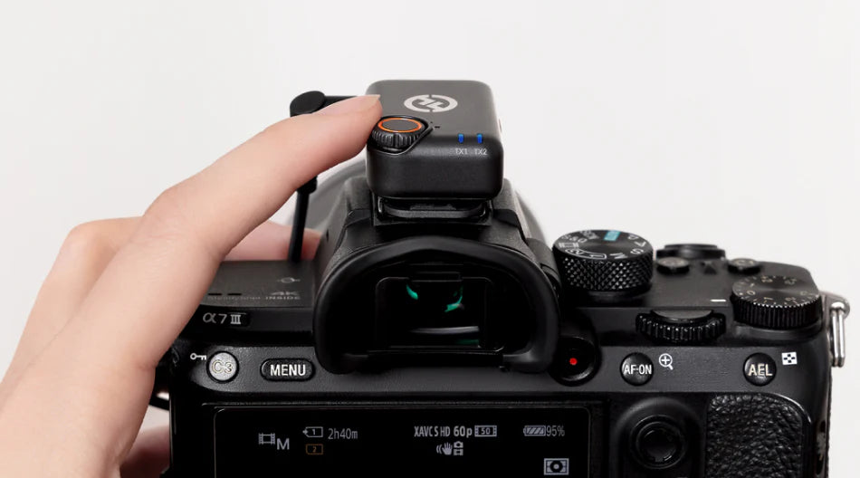 Hollyland Lark M2S Ultimate Combo wireless microphone system with camera, USB-C, and Lightning connectors showing detailed setup.
