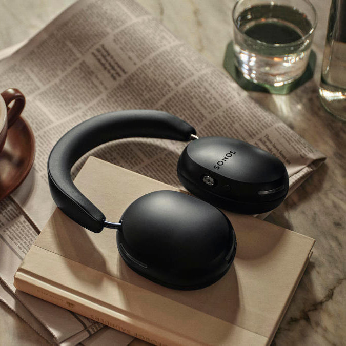 Sonos Ace wireless headphones in black with cushioned ear cups and adjustable headband, designed for high-quality sound.