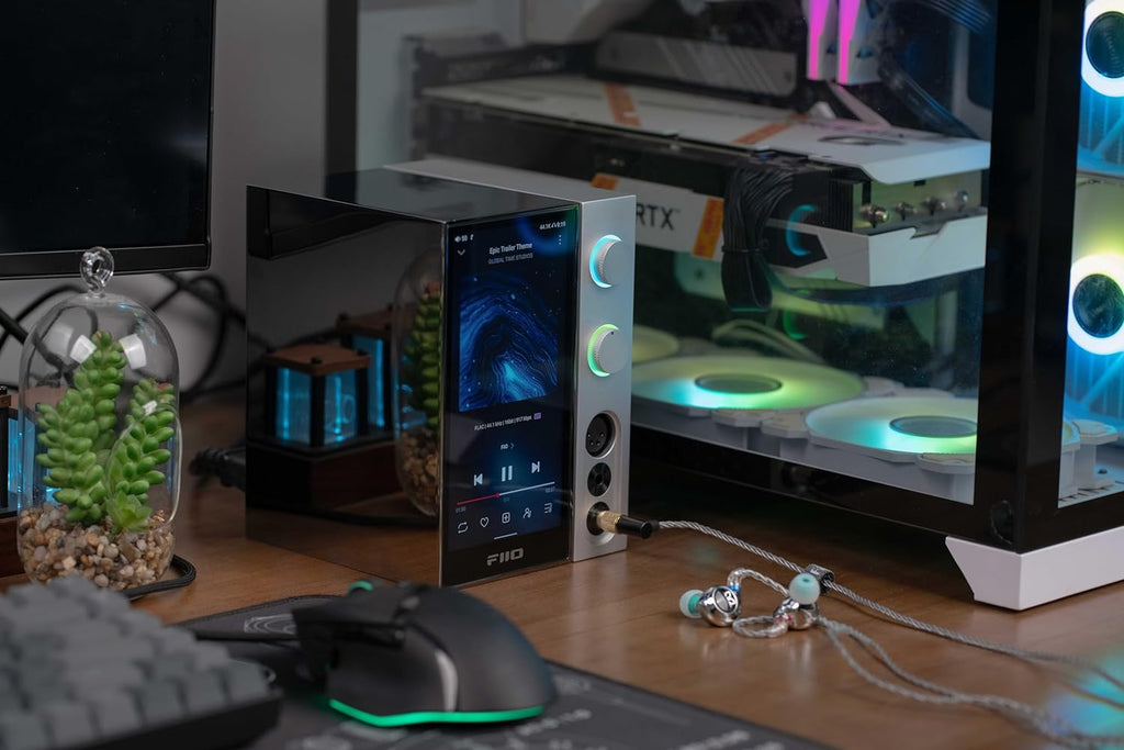 FiiO R9 music streamer device with sleek black design and multiple input ports, used for high-quality audio streaming.