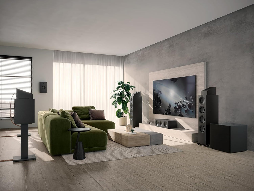 KEF Q6 Meta center speaker with sleek black design, showcasing its front grille and modern build for high-quality home audio.