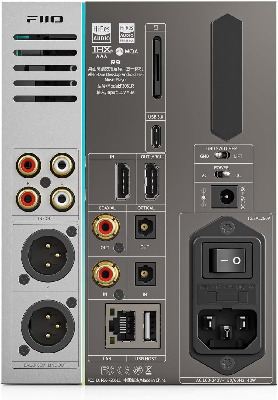FiiO R9 music streamer with sleek black design and multiple audio ports, showcasing modern digital audio equipment.