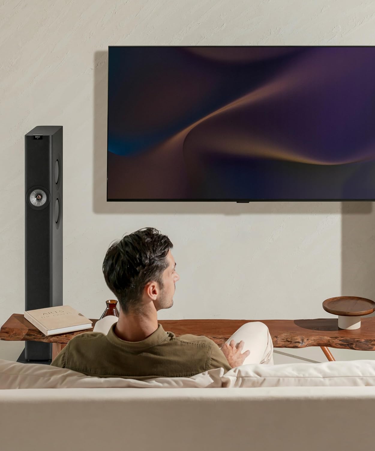 KEF LS60 Wireless floorstanding speakers with sleek black finish and modern design, showcasing their elegant and high-quality build.
