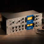 Warm Audio WA76-A vintage-style compressor with blue stripe design, professional audio effects and accessories.