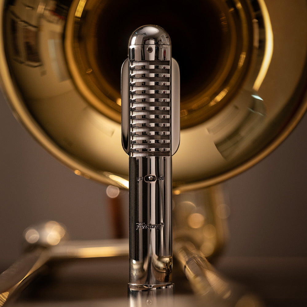 Warm Audio Fen-tone ribbon microphone shown with its sleek design and vintage-inspired build for studio recording.