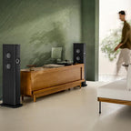 KEF LS60 Wireless floorstanding speakers with sleek black finish and modern design, showcasing high-quality audio performance.