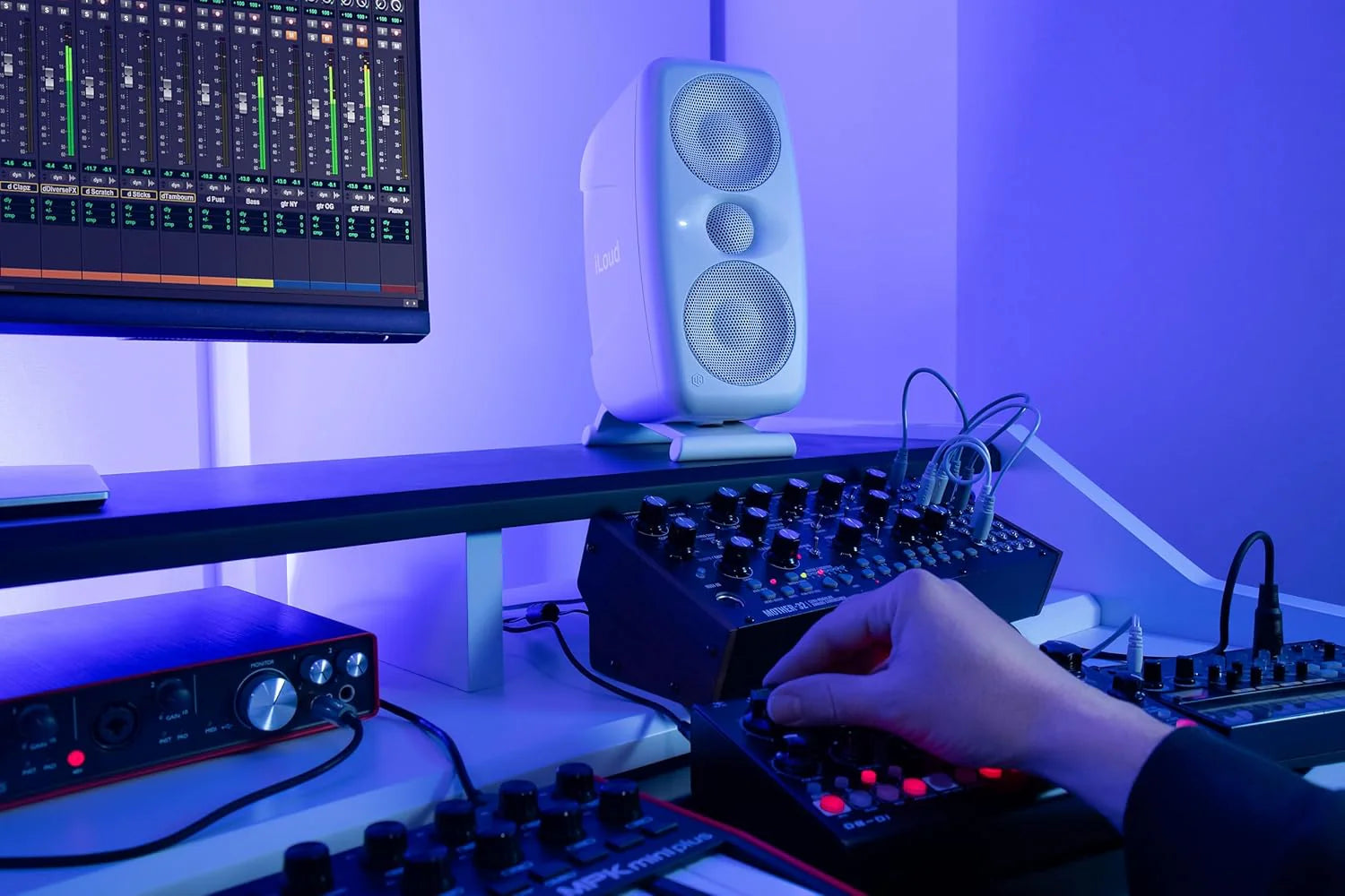 IK Multimedia iLoud MTM MK2 active nearfield studio monitors with sleek black finish and compact design for accurate audio playback.
