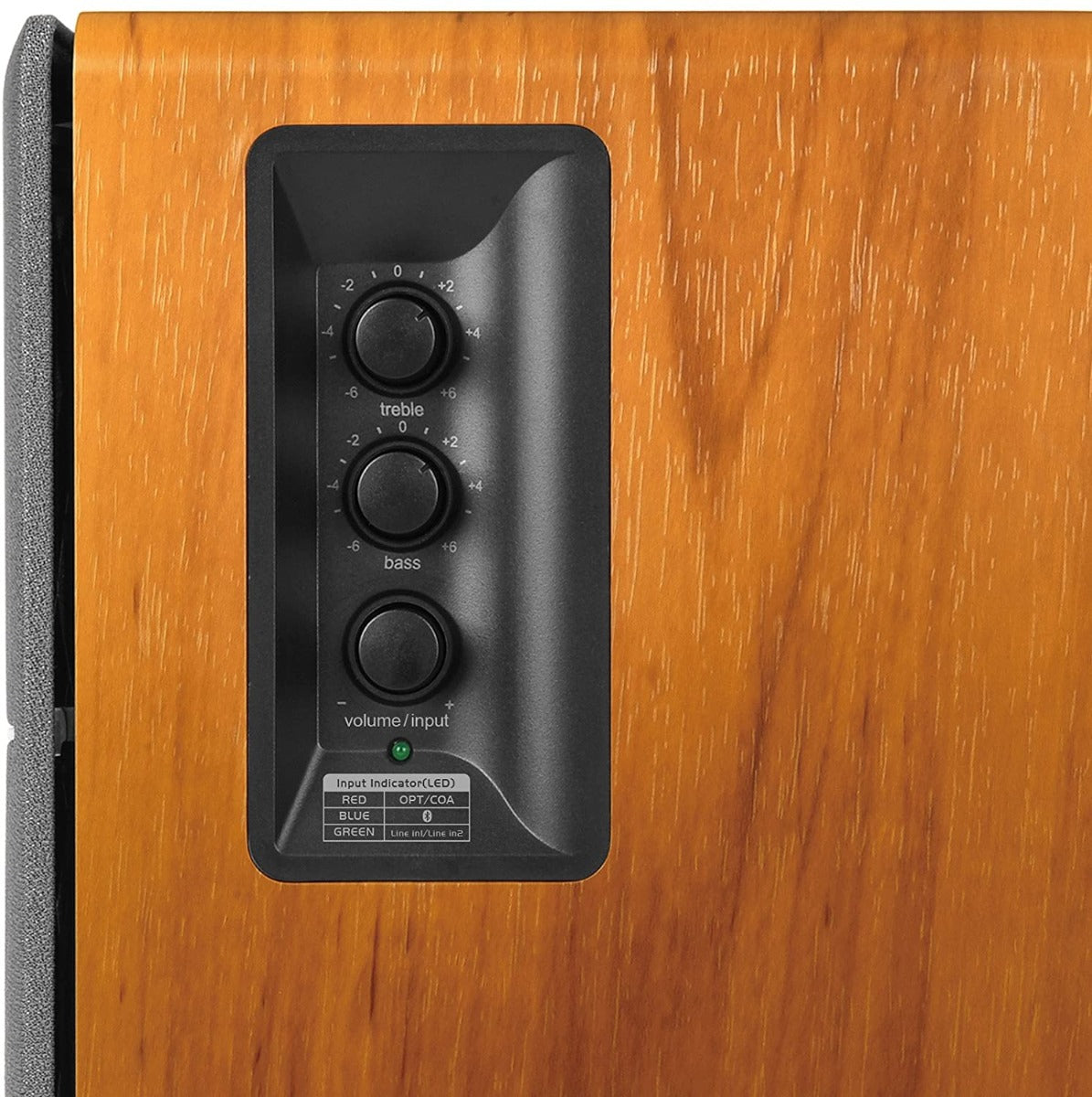 Edifier R1280DBS desktop speakers with wooden finish and control knobs, designed for high-quality audio on a computer desk.