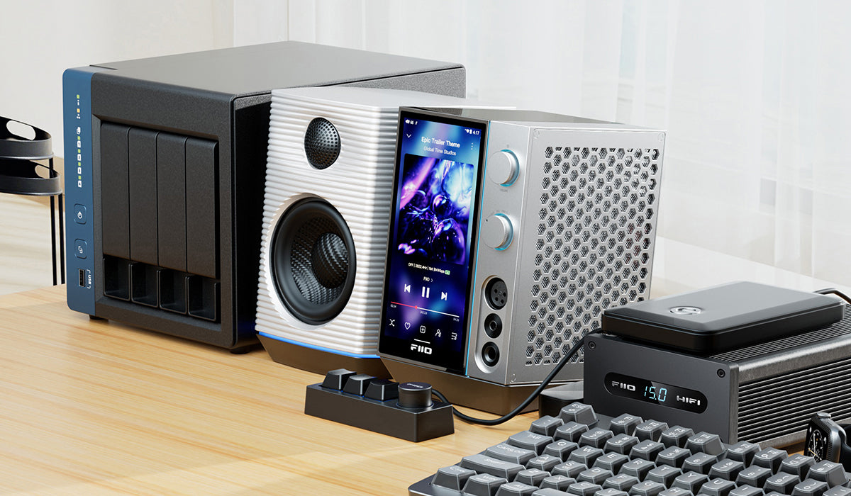 FiiO R9 music streamer device with sleek black design, multiple input ports, and control buttons for high-quality audio streaming.