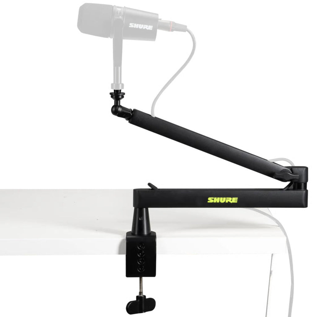 Shure SH-BROADCAST2 broadcast microphone arms mounted on a desk with adjustable arms and microphone attachment for professional broadcasting.