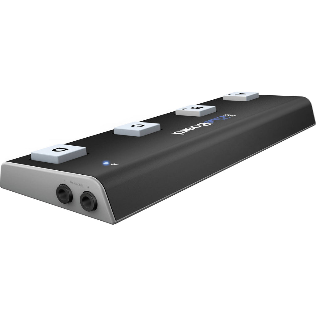 IK Multimedia iRig Blueboard MIDI footswitch with four foot pedals, compact black guitar pedal controller, on a white background.