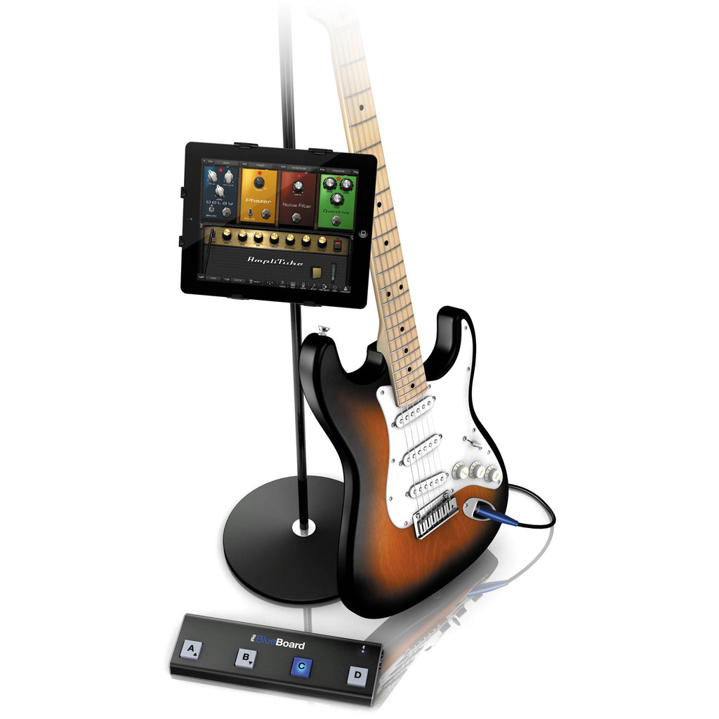 IK Multimedia iRig Blueboard MIDI footswitch with four pedals for guitar and music control, compact and portable.