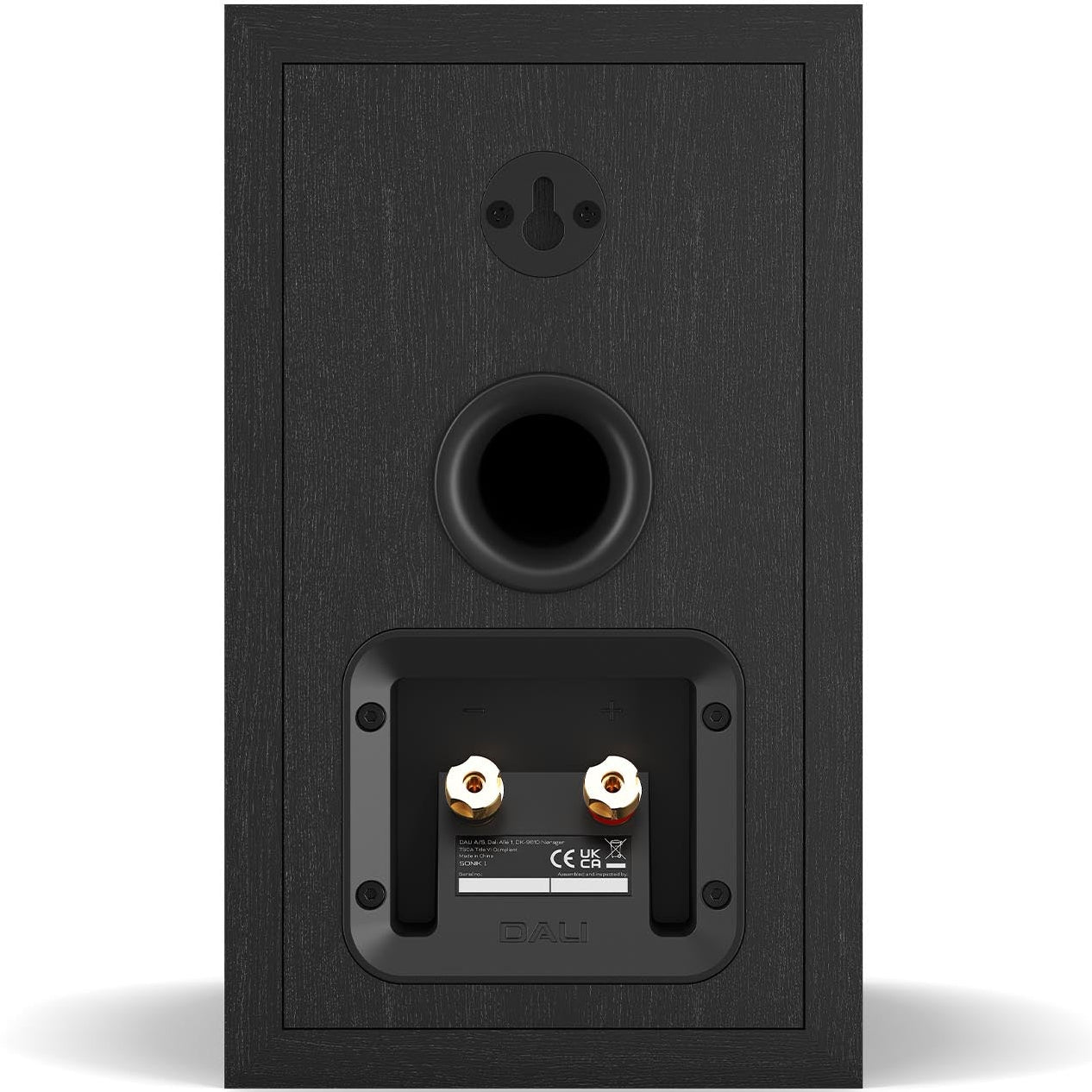 DALI Sonik 1 passive bookshelf speakers with black wood grain finish and compact design, ideal for home audio systems.