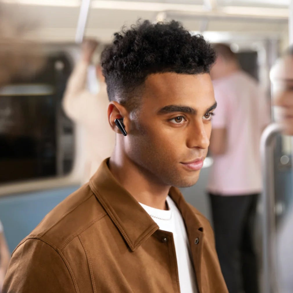 Wireless in-ear headphones from Soundcore Liberty 4 Pro with sleek black design and ergonomic ear tips.