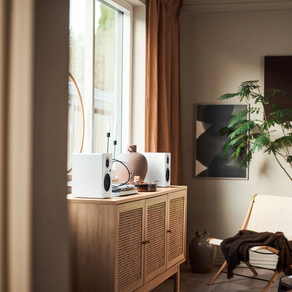 Argon Audio Forte A4 MK2 active bookshelf speakers, white finish, with drivers and control knobs visible in the image