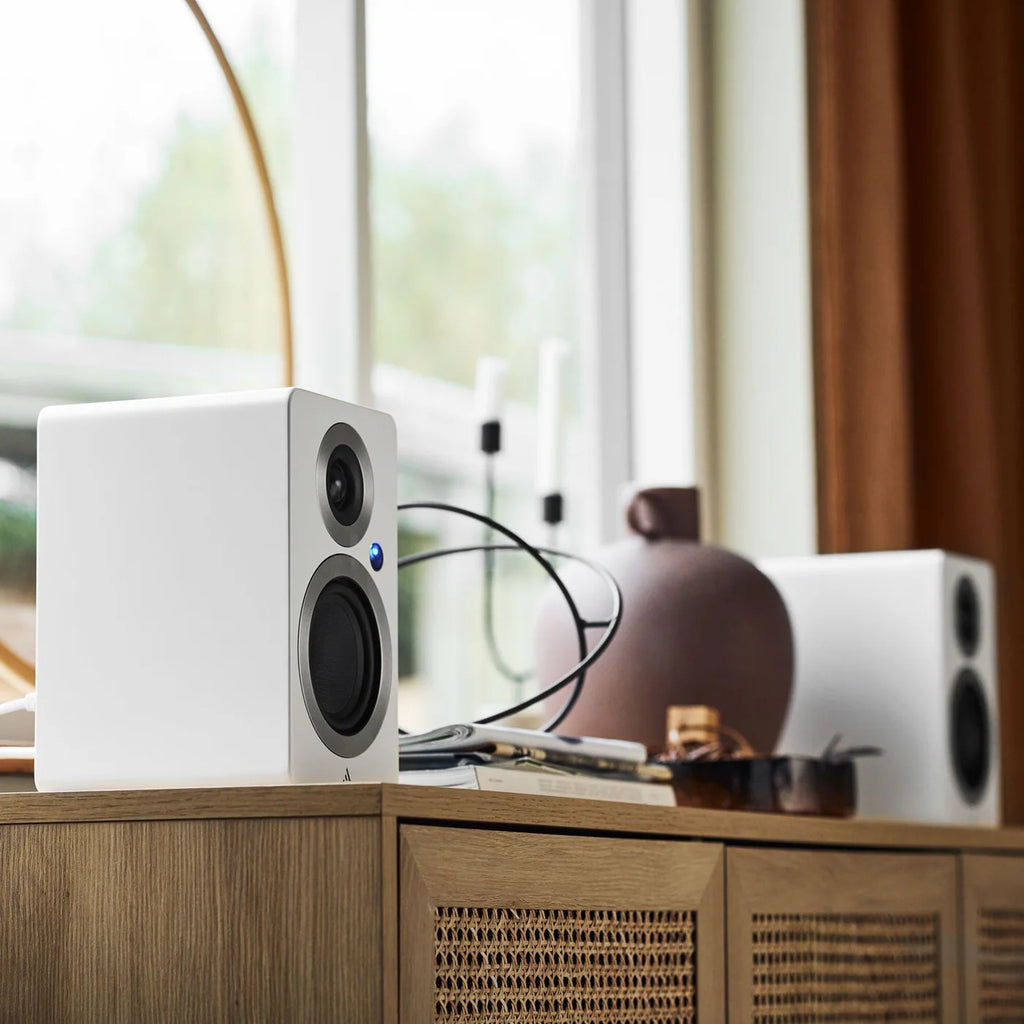 Argon Audio Forte A4 MK2 active bookshelf speakers with white finish, showcasing their sleek design and front-facing speaker drivers.