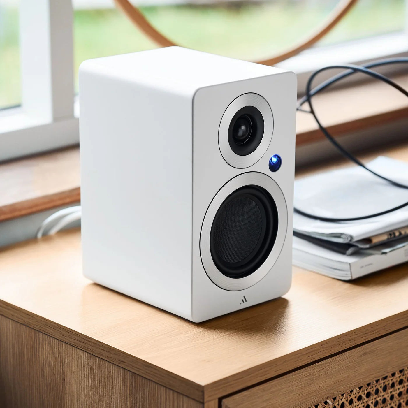 Argon Audio Forte A4 MK2 active bookshelf speakers in white, showing the front view with drivers and sleek design.