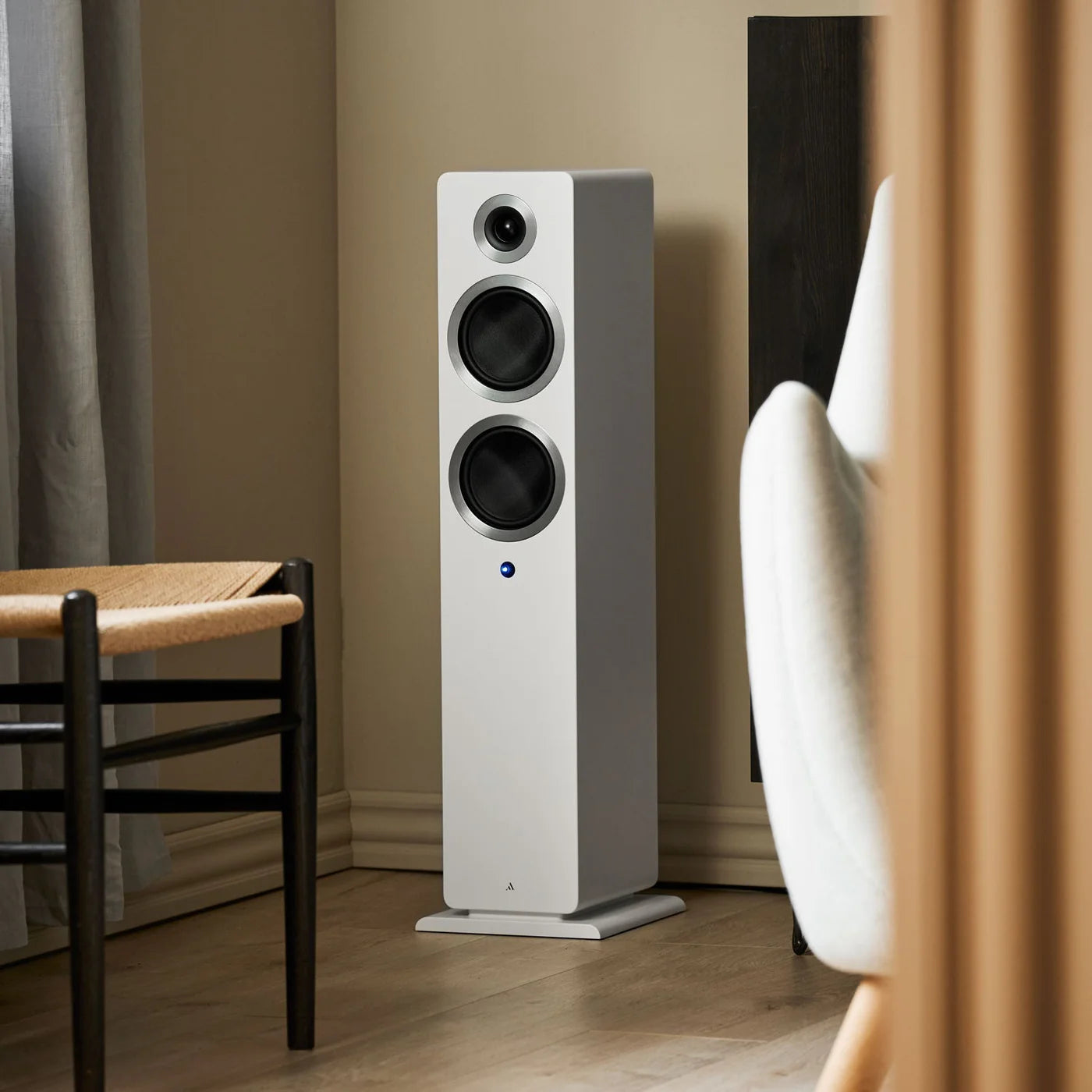 Argon Audio Forte A55 WiFi floorstanding speakers with white finish, tall speaker cabinets, and sleek modern design.