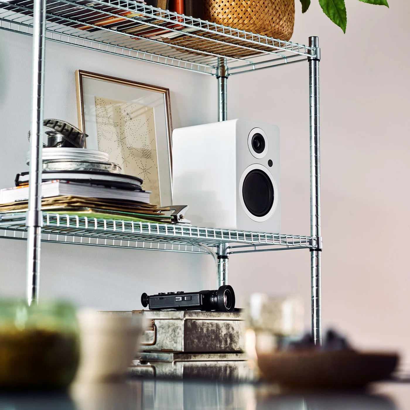 Argon Audio Forte A5 MK2 active bookshelf speakers with white finish and front-facing drivers on a wooden surface.