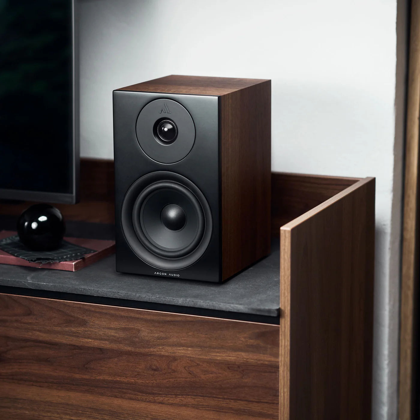 Argon Audio Forus 5 passive bookshelf speakers with black wood finish and front-facing drivers, designed for home audio use.