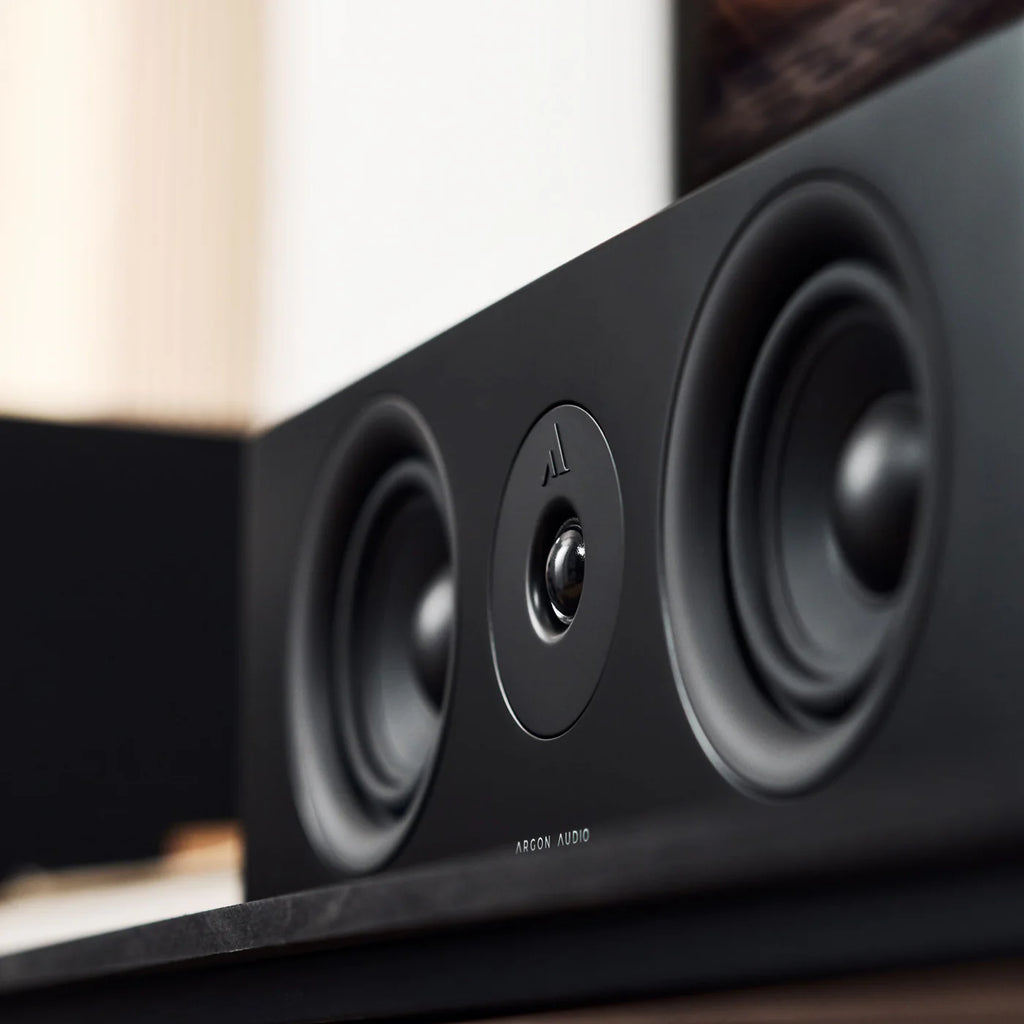 Argon Audio Forus Center speaker in black, showcasing its modern design and front grille for home theater or audio setup.