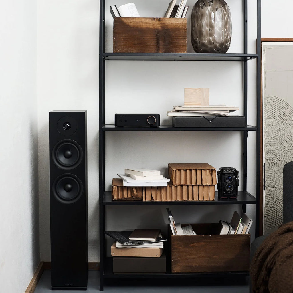 Black Argon Audio Forus 55 passive floorstanding speakers with sleek design and sturdy wooden bases.