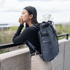 A Wandrd Prvke 15L photo bundle in Aegean Blue with camera gear and accessories in a lifestyle setting.