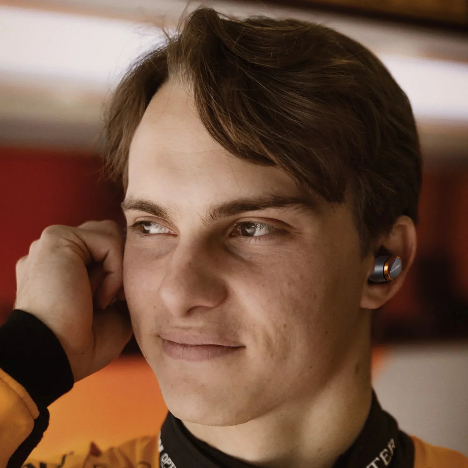 Bowers & Wilkins Pi8 wireless in-ear headphones with sleek black design and compact charging case visible in the image