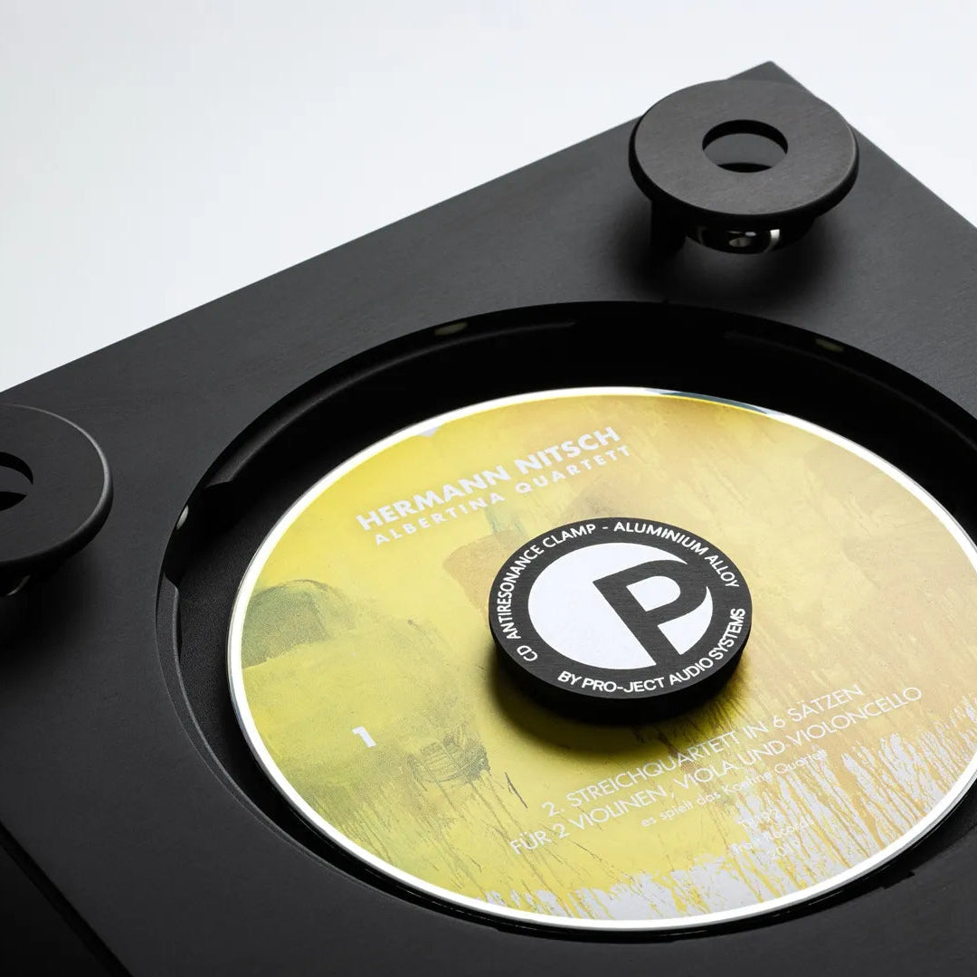 Black Pro-Ject CD Box RS2 Tube CD player with open lid, showcasing the sleek design and high-quality build.