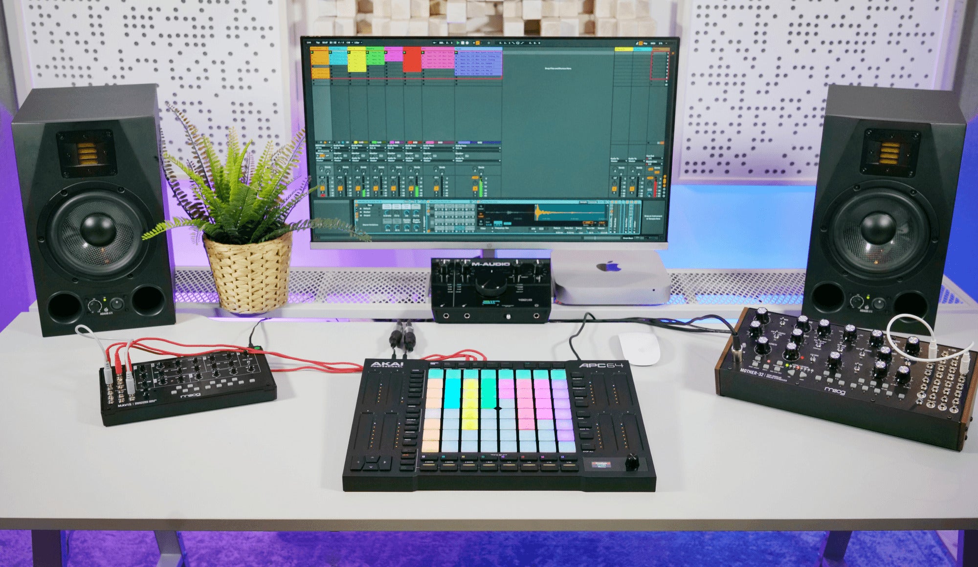 Akai Professional APC64 MIDI controller with 64 pads, knobs, and faders for music production and live performance.