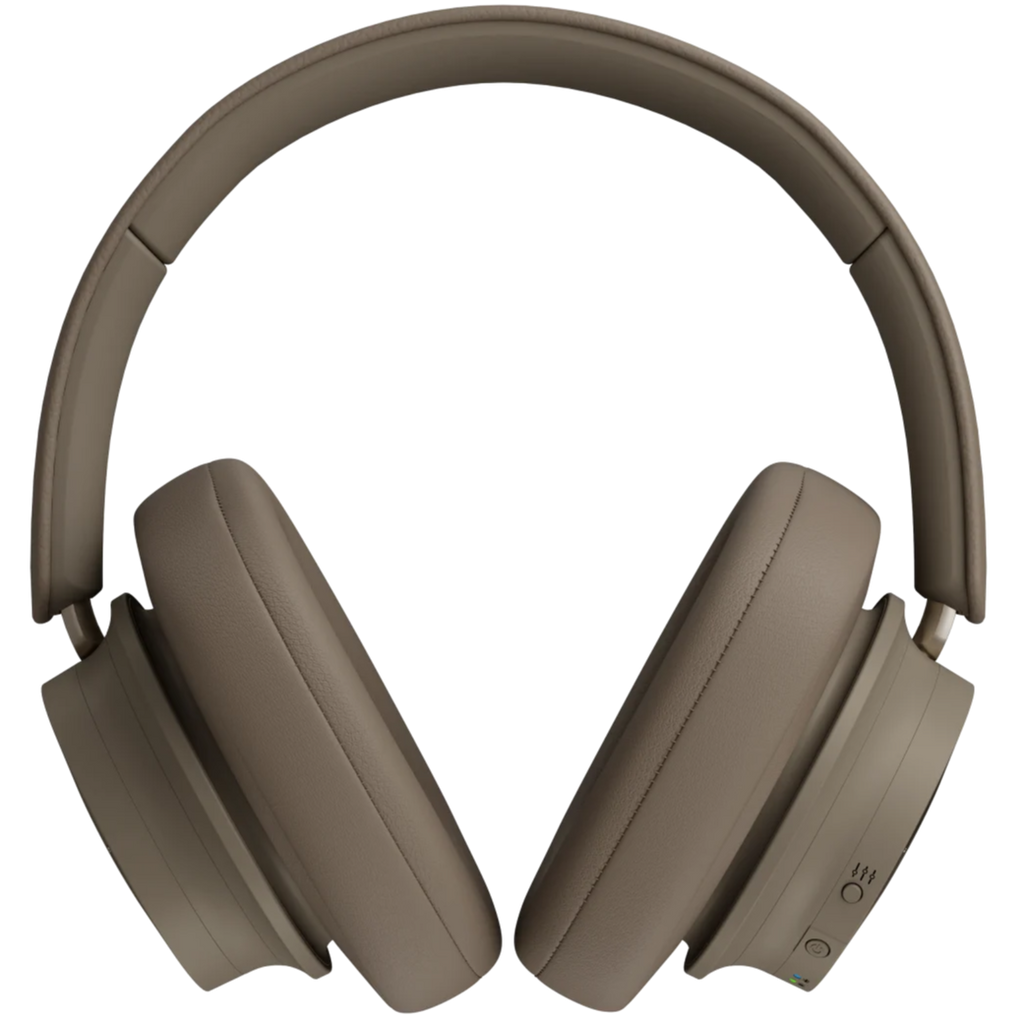 DALI iO-12 wireless headphones in mocha grey with over-ear design and plush ear cushions, showcasing their stylish and comfortable fit.