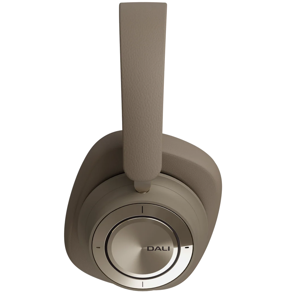DALI iO-12 wireless headphones in mocha grey with sleek over-ear design and padded ear cushions.