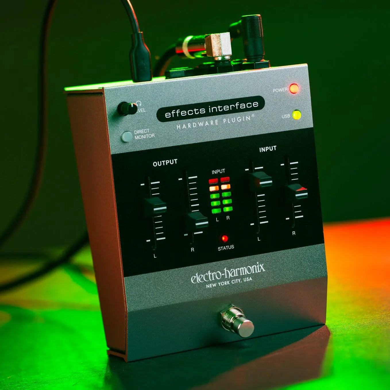 Electro Harmonix Effects Interface hardware pedal, showing the compact black unit with control knobs and input/output jacks.