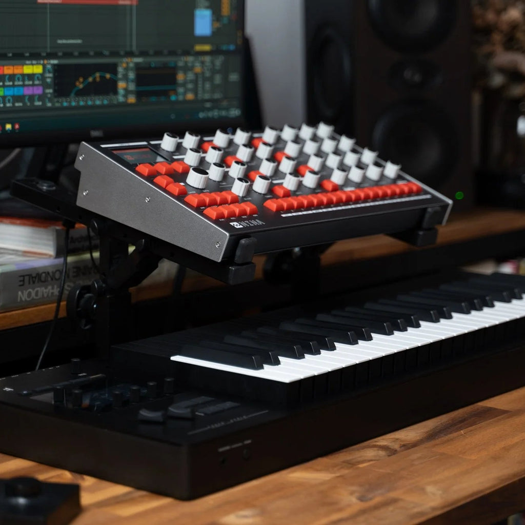 Melbourne Instruments Nina semi-modular synthesizer with multiple patch points and colorful interface controls.