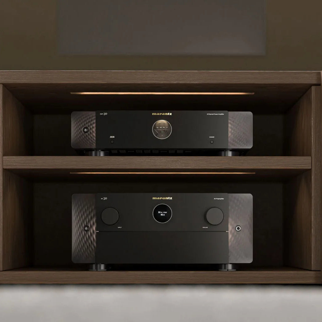 Marantz AMP 30 stereo amplifier with sleek black design and control knobs, showcasing high-quality audio equipment.