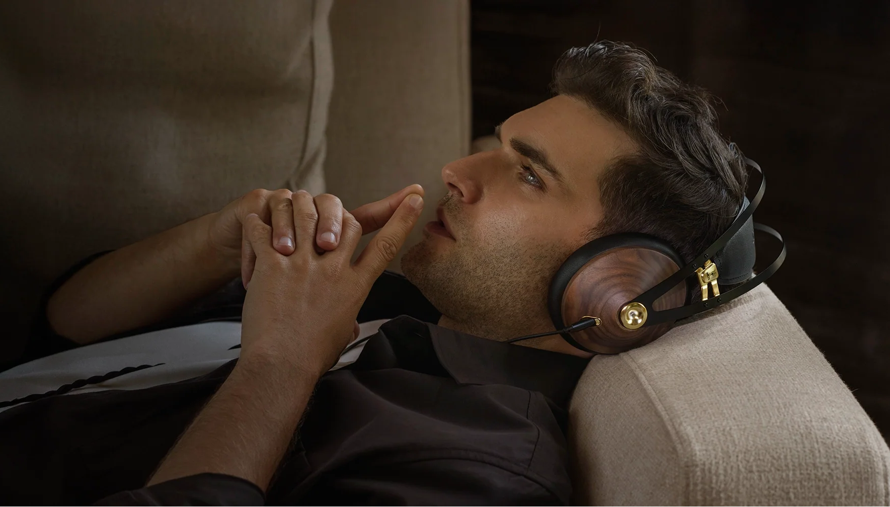 Meze Audio 99 Classics 2nd Gen wired headphones with wooden ear cups and black headband, close-up view of the stylish design