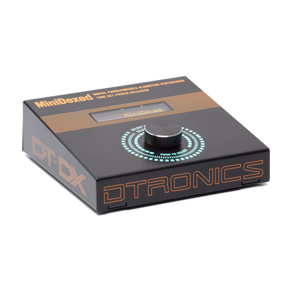 Dtronics DT-DX synthesizer in compact form with control knobs and keyboard layout, designed for electronic music production.