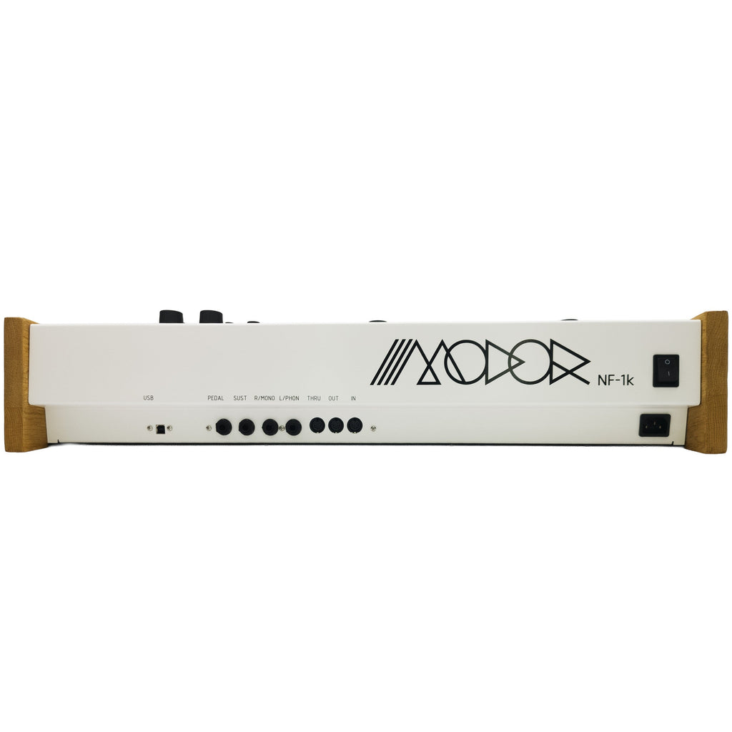 Modor NF-1k keyboard synthesizer with black controls and display, showing various knobs and buttons on a sleek electronic music device.