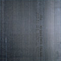 Black vinyl LP cover of New Order's Brotherhood album, featuring the band's artwork and album title in bold text.
