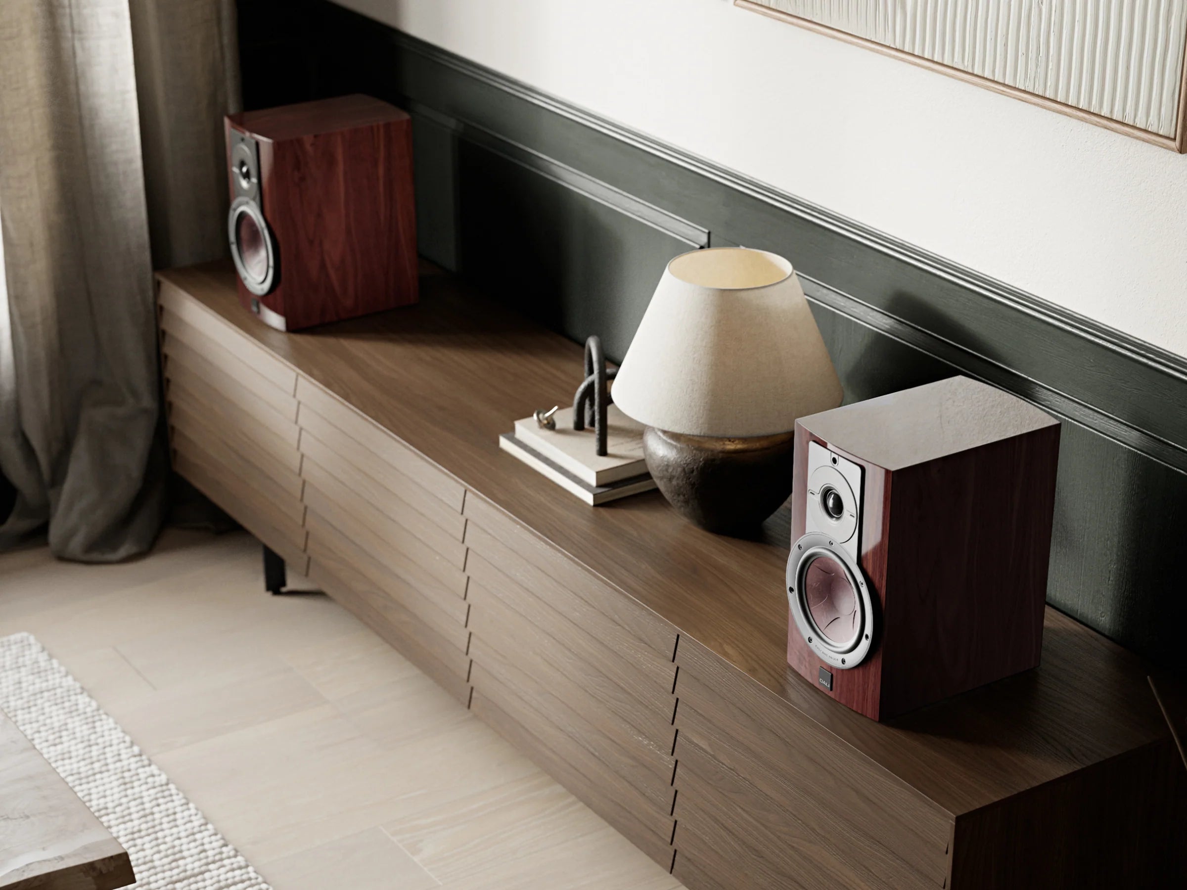 DALI Rubikore 2 passive bookshelf speakers shown with sleek black finish and compact design for home audio setup.