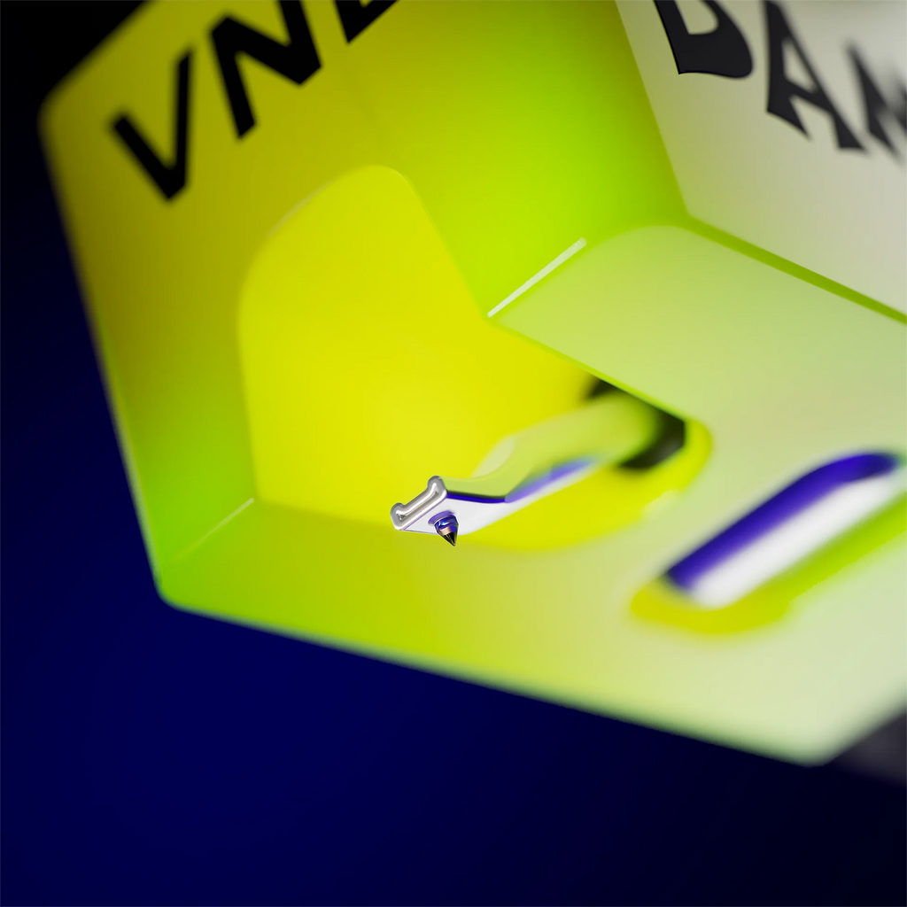 Bottom view of the Ortofon VNL DANCE turntable cartridge stylus, showcasing the stylus tip and cartridge body.