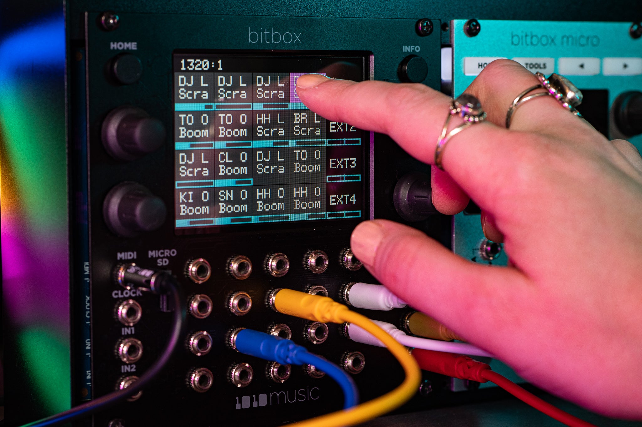 1010music Bitbox MK2 semi-modular synthesizer with knobs, buttons, and LED display for electronic music production.