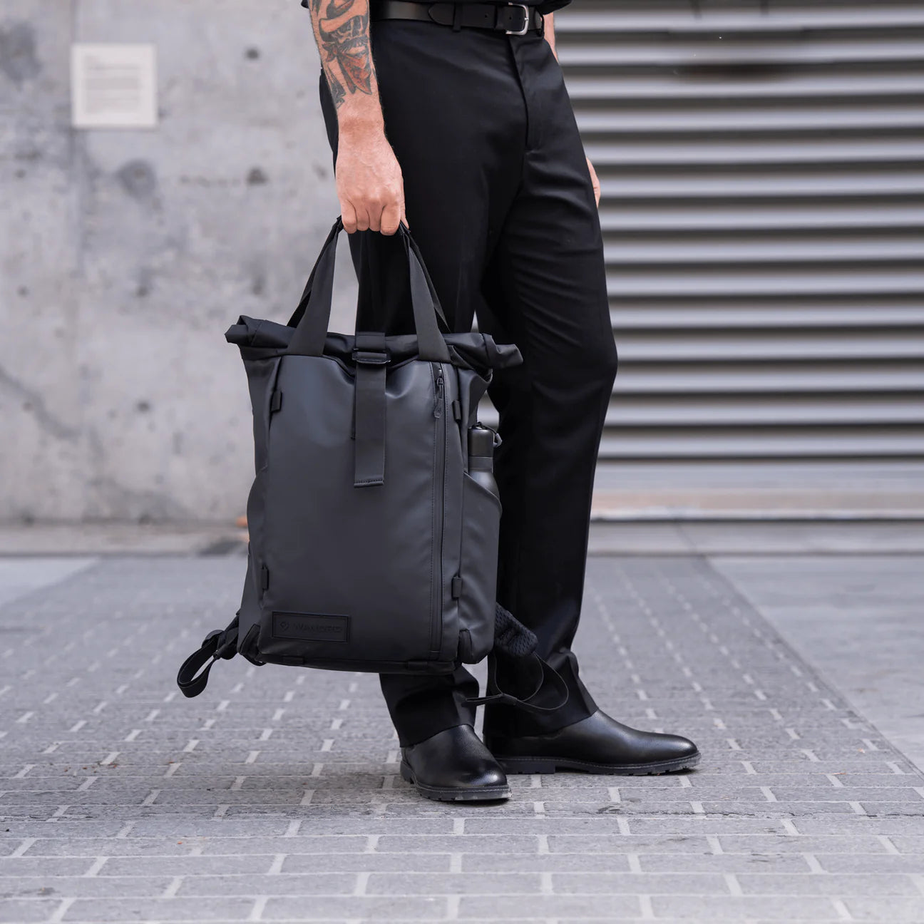 Black Wandrd Prvke EDC 18L video equipment bag with durable exterior and compact design, ideal for photographers and videographers.