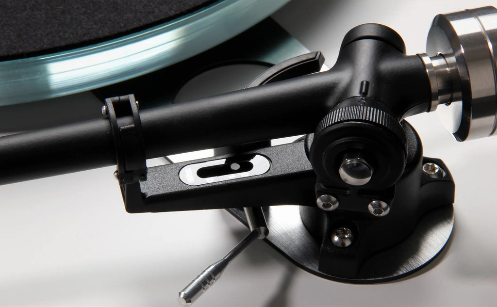 Rega Planar 6 turntable with Polaris Grey finish and Nd5 cartridge, showcasing the sleek design and tonearm details.