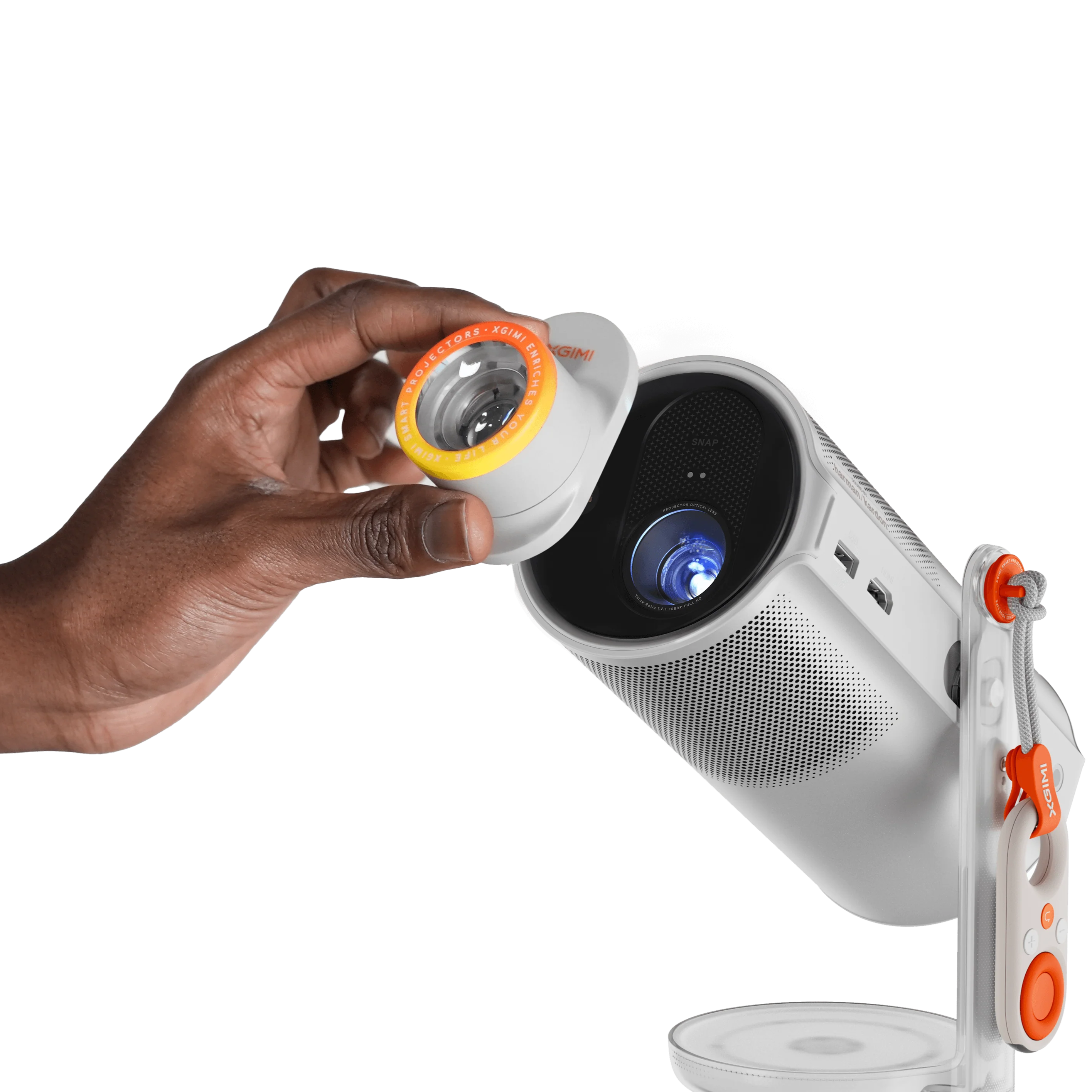 Xgimi Mogo 4 portable projector displaying colorful image on wall, compact design with built-in lens and ventilation.